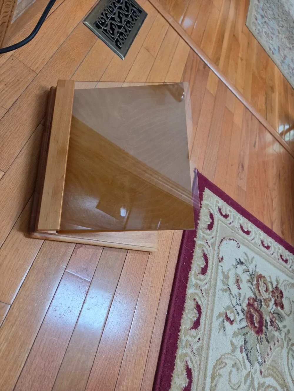 wooden cookbook stand with adjustable slant and an acrylic glass viewing shield
